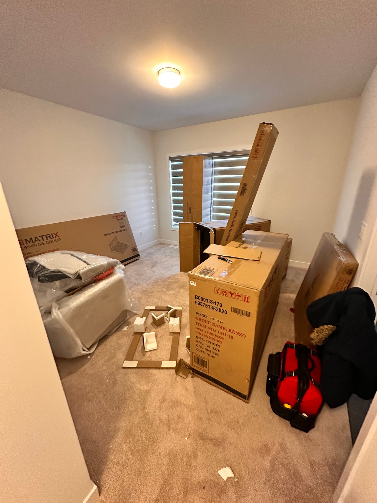 Long hallway with continuous wall paneling